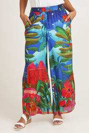 Model Ziara wearing size 10 of the Arabian Nights Pants in colour Print, from the front, cropped image
