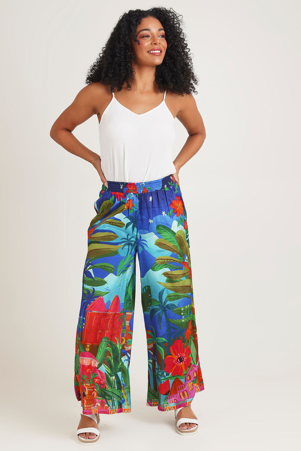 Model Ziara wearing size 10 of the Arabian Nights Pants in colour Print, from the front, showing the whole outfit