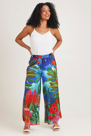 Model Ziara wearing size 10 of the Arabian Nights Pants in colour Print, from the front, showing the whole outfit