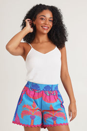 Model Ziara wearing size 10 of the Celestial Blue Cotton Shorts in colour Blue, from the front, cropped image