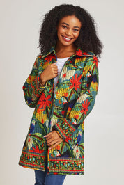 Model Ziara wearing size 10 of the Galapagos Quilted Coat in colour Galapagos, from the front, cropped image