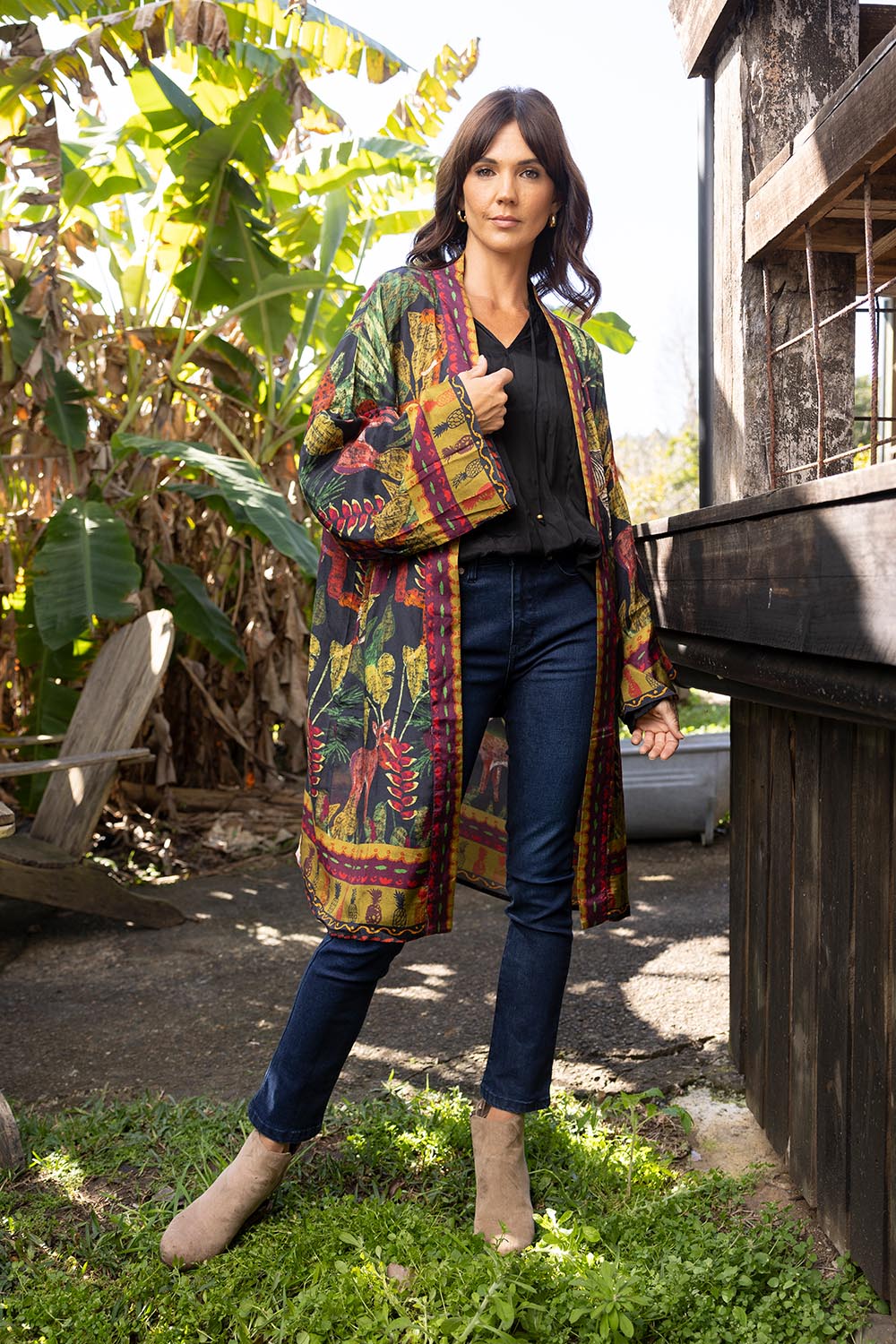 A model wearing the Amazonia Kimono in colour Amazonia, from the front, showing the whole outfit