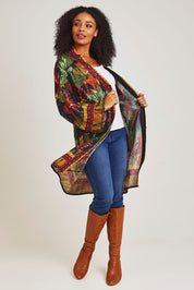 Model Ziara wearing size 10 of the Amazonia Kimono in colour Amazonia, from the front, showing the whole outfit