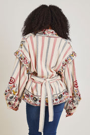 Model Ziara wearing size 10 of the Embroidered Cotton Jacket in colour Print, from the back