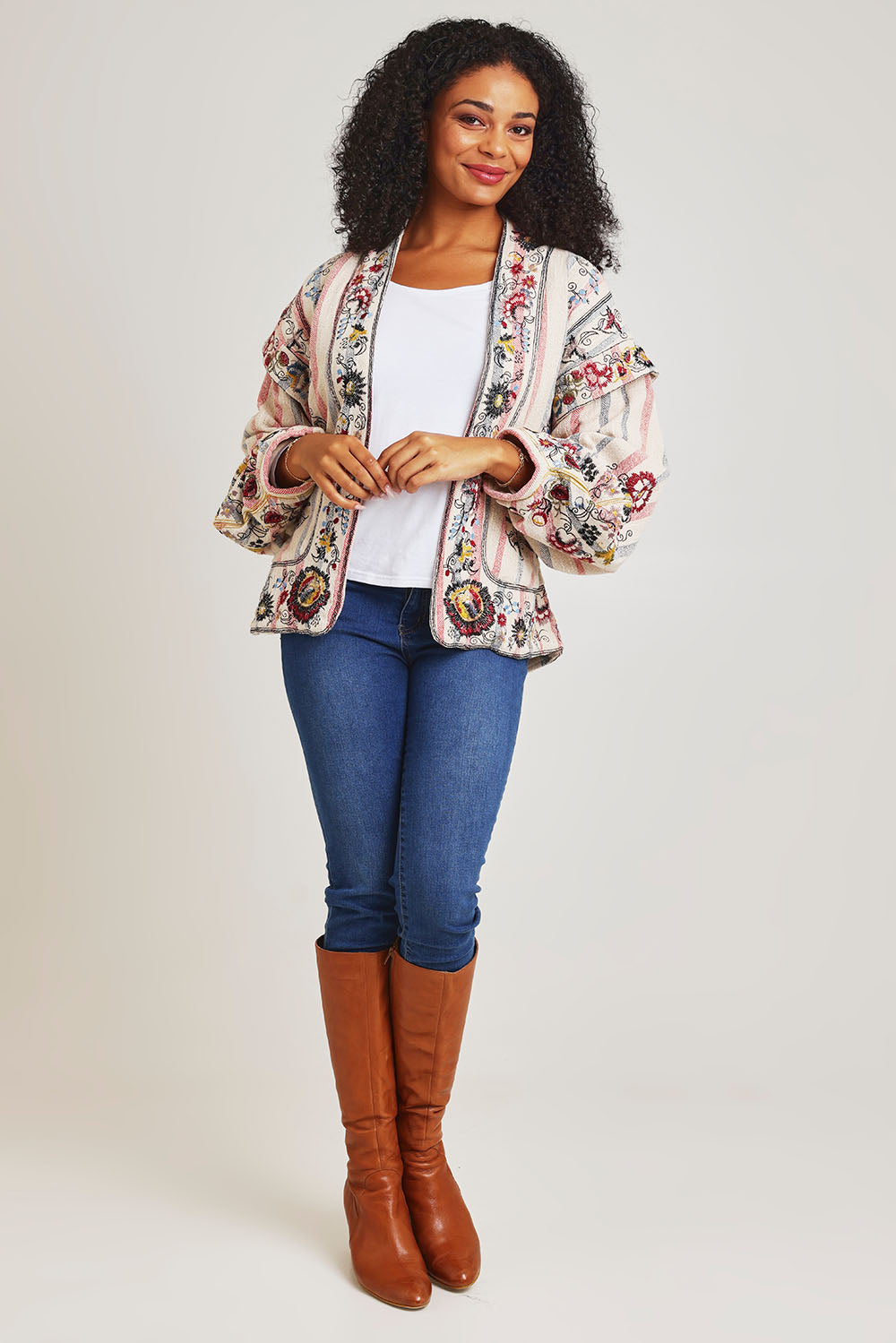 Model Ziara wearing size 10 of the Embroidered Cotton Jacket in colour Print, from the front, showing the whole outfit