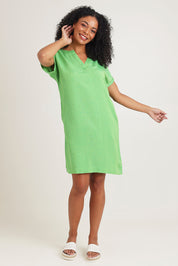 Model Ziara wearing size 10 of the Linen Blend Solid Shift Dress in colour Green (Green), from the front, showing the whole outfit