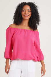 Model Ziara wearing size 10 of the Gather Neck 3/4 Sleeve Linen Blend Top in colour Hotpink (Blue), from the front, cropped image