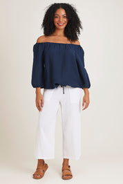 Model Ziara wearing size 10 of the Gather Neck 3/4 Sleeve Linen Blend Top in colour Navy (Blue), from the front, showing the whole outfit