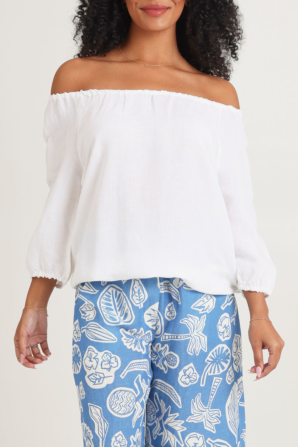 Model Ziara wearing size 10 of the Gather Neck 3/4 Sleeve Linen Blend Top in colour White (White), from the front, cropped image