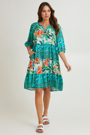 Model Madeline wearing size 10 of the Olivia Layers 3/4 Sleeve Dress in colour Print (Blue), from the front, showing the whole outfit