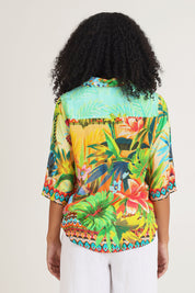 Model Ziara wearing size 10 of the Georgia Shirt in colour Print, from the back