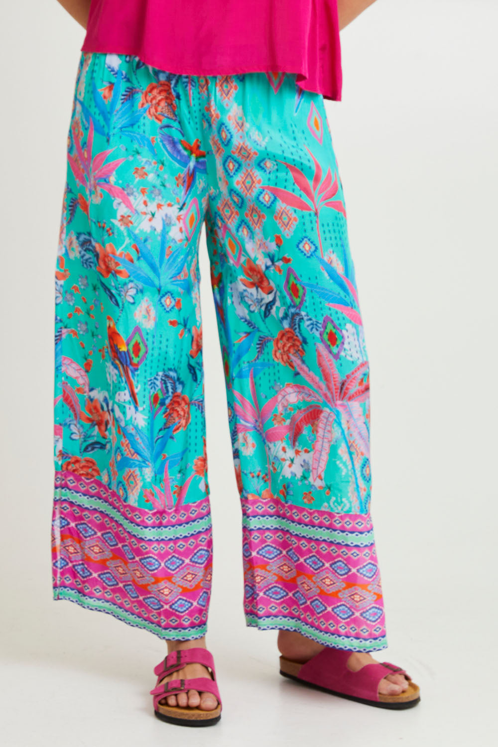 Model Madeline wearing size 10 of the Marina Pant in colour Print (Blue), from the front, cropped image