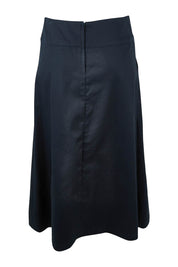 Product shot of the Amy Skirt in colour Navy (Blue), from the back