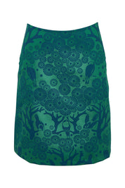 Product shot of the Sandy Cotton Short Skirt in colour Greenblue (Green), from the front