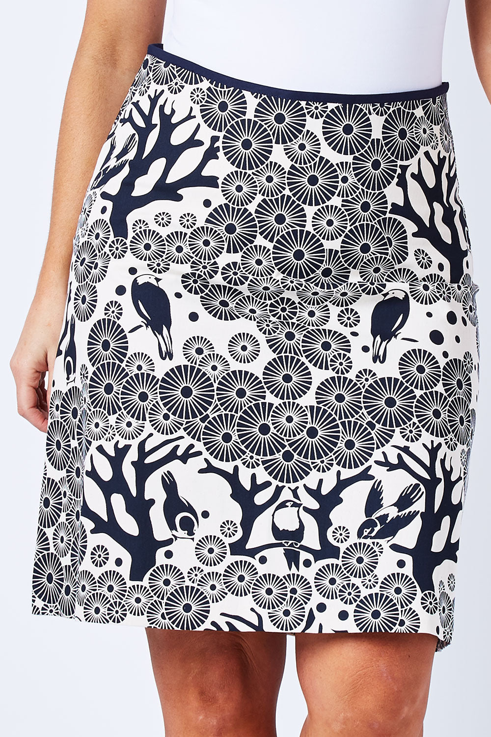 Model Laura wearing size M of the Mikko Aline Skirt in colour InkNatural, from the front, cropped image