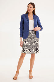 Model Madeline wearing size S of the Mikko Aline Skirt in colour InkNatural, from the front, showing the whole outfit