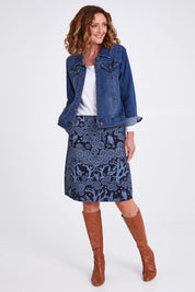 Model Emma wearing size S of the Mikko Zoe Skirt in colour Navy (Blue), from the front, showing the whole outfit