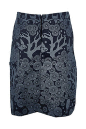 Product shot of the Mikko Zoe Skirt in colour Navy (Blue), from the back
