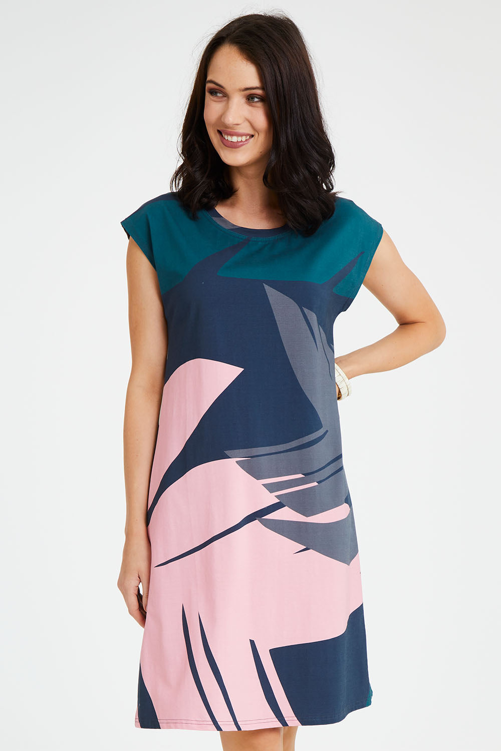 Model Andrea wearing size S of the Bobby Dress in colour Pink (Blue), from the front, cropped image