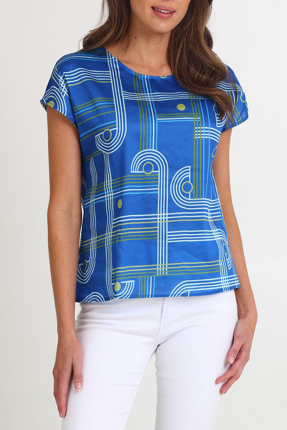 Model Madeline wearing size S of the Tilly Cotton Top in colour Blue (Blue), from the front, cropped image