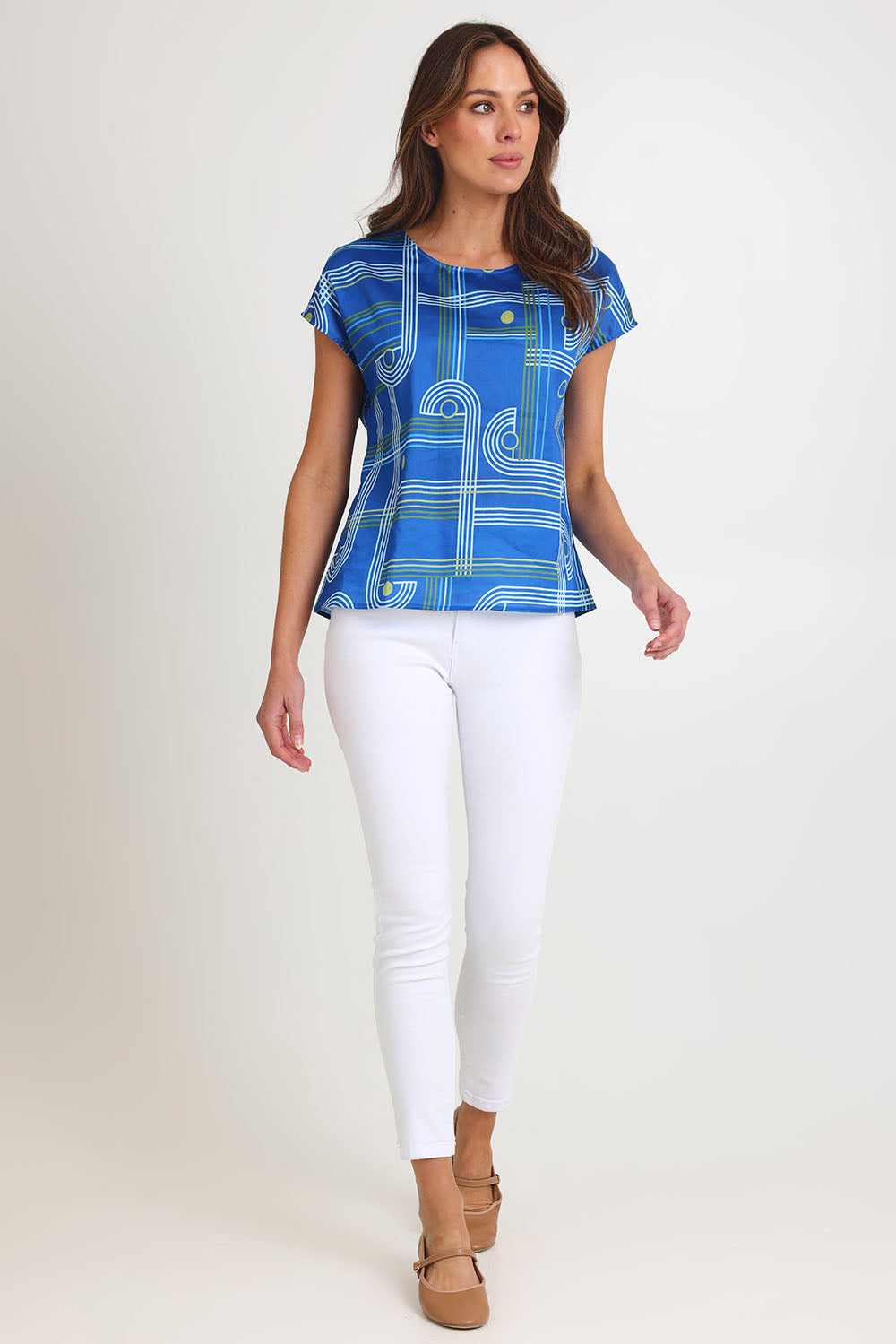 Model Madeline wearing size S of the Tilly Cotton Top in colour Blue (Blue), from the front, showing the whole outfit