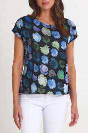 Model Madeline wearing size S of the Tilly Cotton Top in colour Black (Black), from the front, cropped image