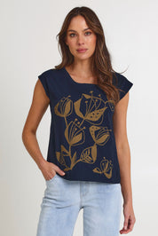 Model Madeline wearing size S of the Bobby Cotton Top in colour Navylark (Blue), from the front, cropped image