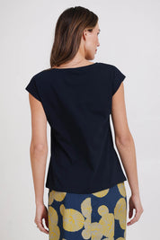 Model Madelinec wearing size 10 of the Bobby Top - Navy in colour Navy, from the back