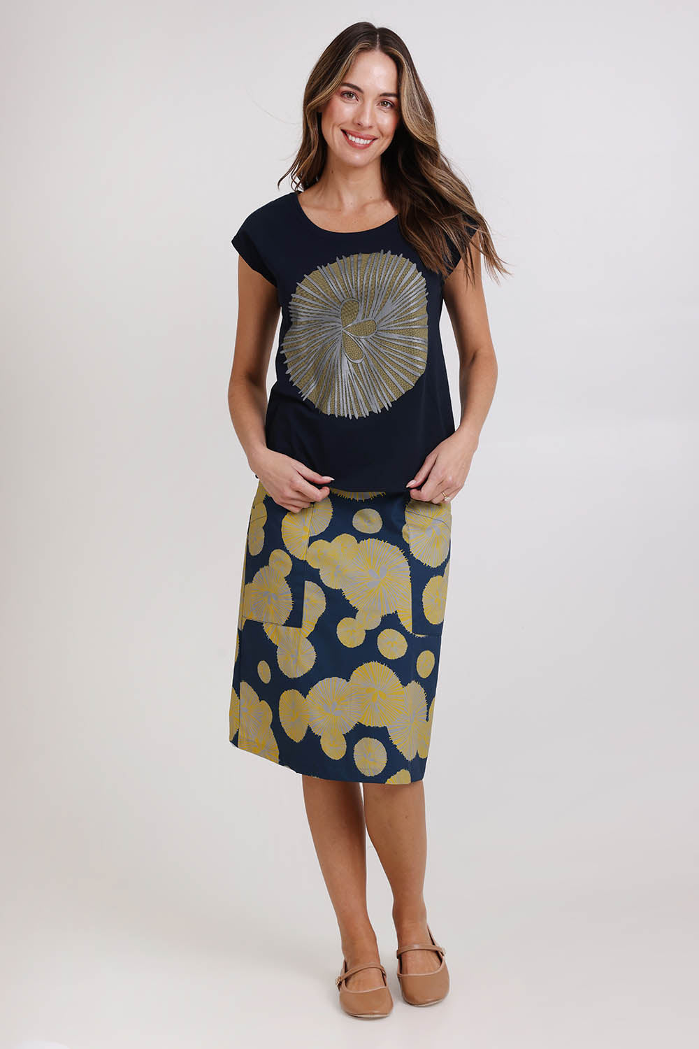 Model Madelinec wearing size 10 of the Bobby Top - Navy in colour Navy, from the front