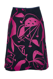 Product shot of the Avril Cotton Skirt in colour Navy (Blue), from the back