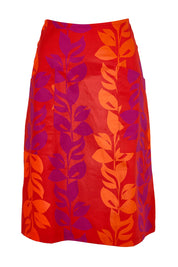 Product shot of the Heidi Long Skirt - Red in colour Red, from the front