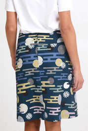 Model Madelinec wearing size 10 of the Amy Skirt - Cloudblue in colour Cloudblue, from the back
