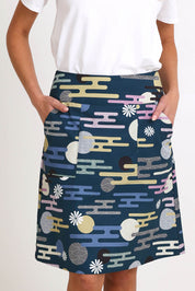 Model Madelinec wearing size 10 of the Amy Skirt - Cloudblue in colour Cloudblue, in a cropped view