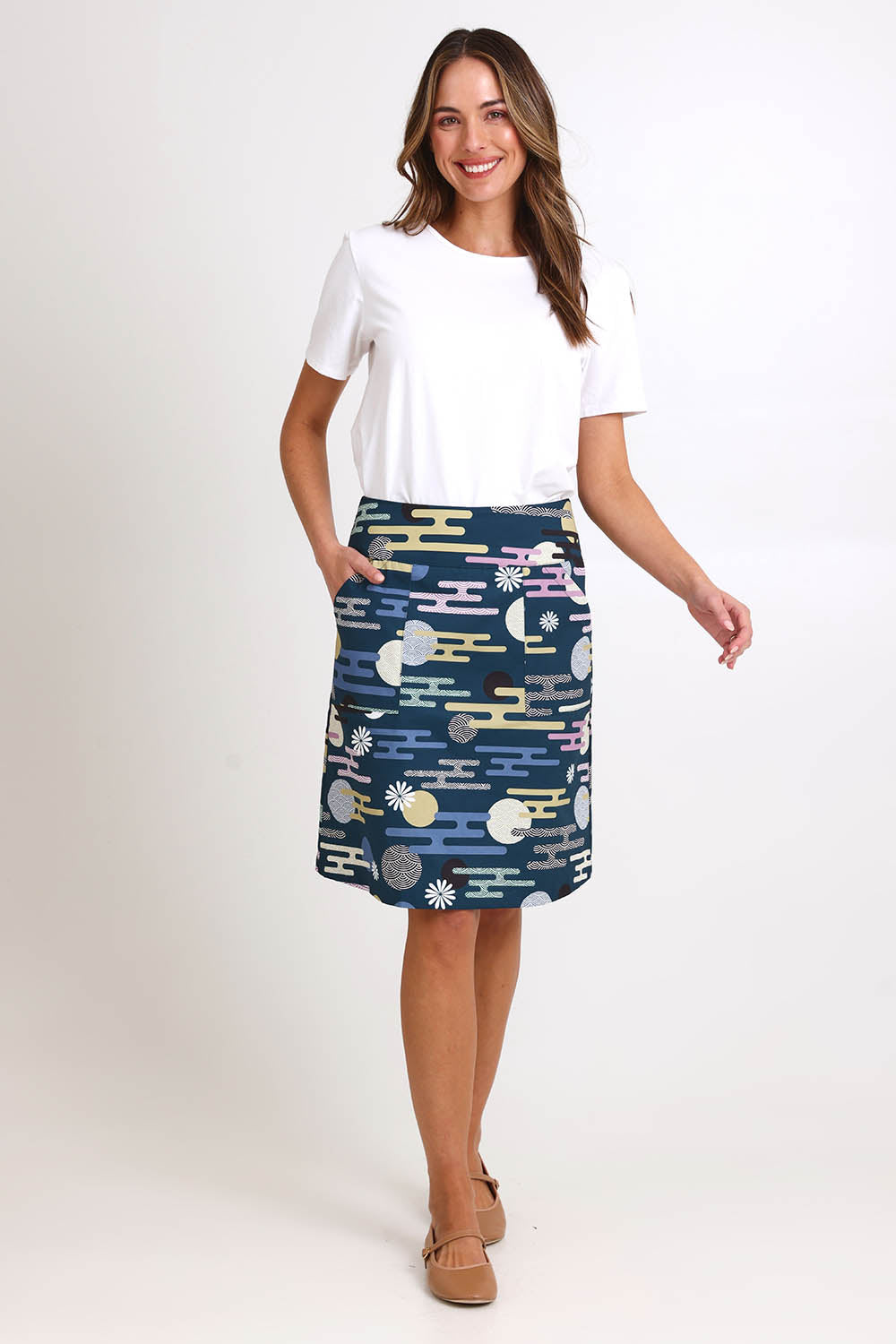 Model Madelinec wearing size 10 of the Amy Skirt - Cloudblue in colour Cloudblue, from the front