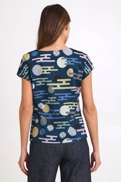 Model Madelinec wearing size 10 of the Tilly Top - Cloudblue in colour Cloudblue, from the back