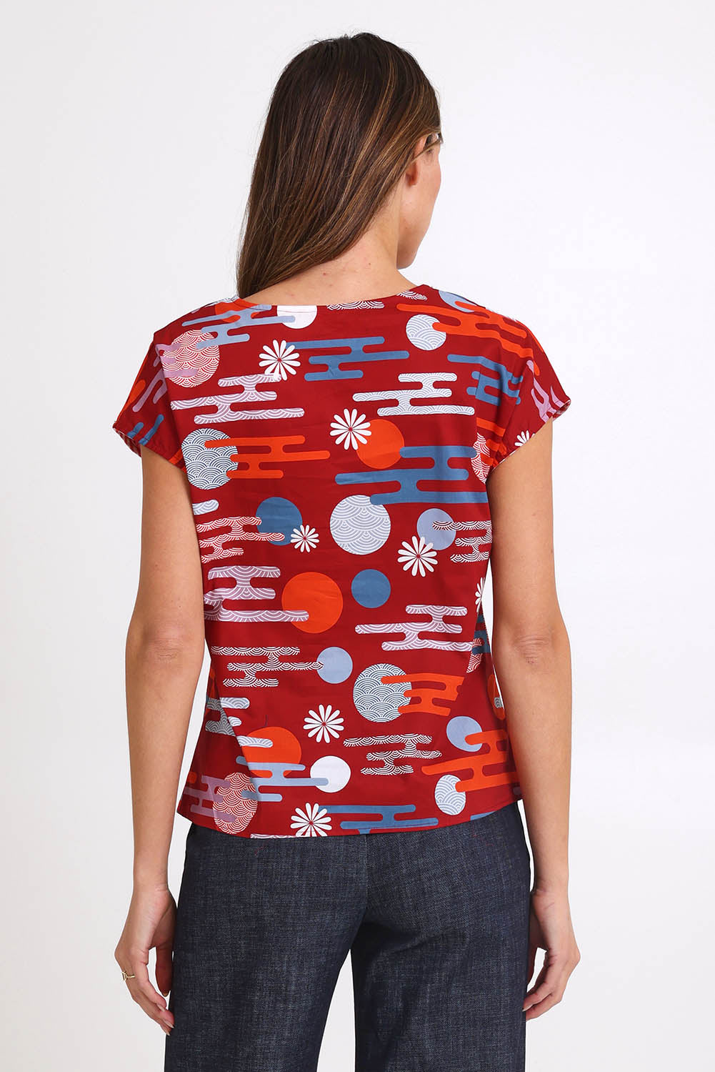 Model Madelinec wearing size 10 of the Tilly Top - Cloudred in colour Cloudred, from the back