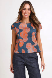 Model Madelinec wearing size 10 of the Thea Top - Smoke in colour Smoke, in a cropped view