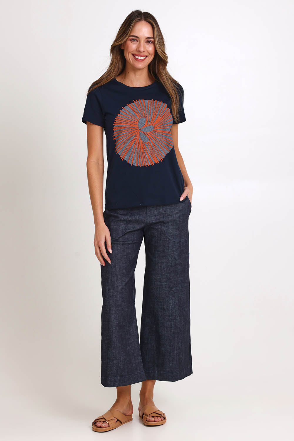 Model Madelinec wearing size 10 of the Girlfriend Tee - Navyorange in colour Navyorange, from the front