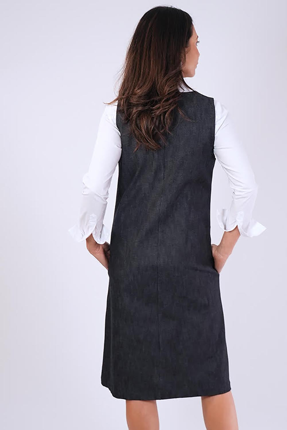 Model Genericm wearing size sample of the Susanne Denim Dress - Denimindigo in colour Denimindigo, from the back