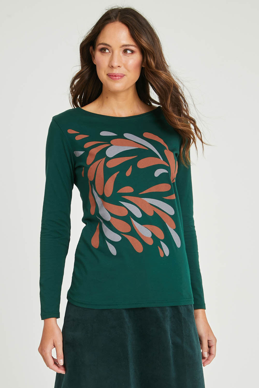 Model Madeline wearing size S of the Hanna Placement Tee in colour Forest (Green), from the front, cropped image