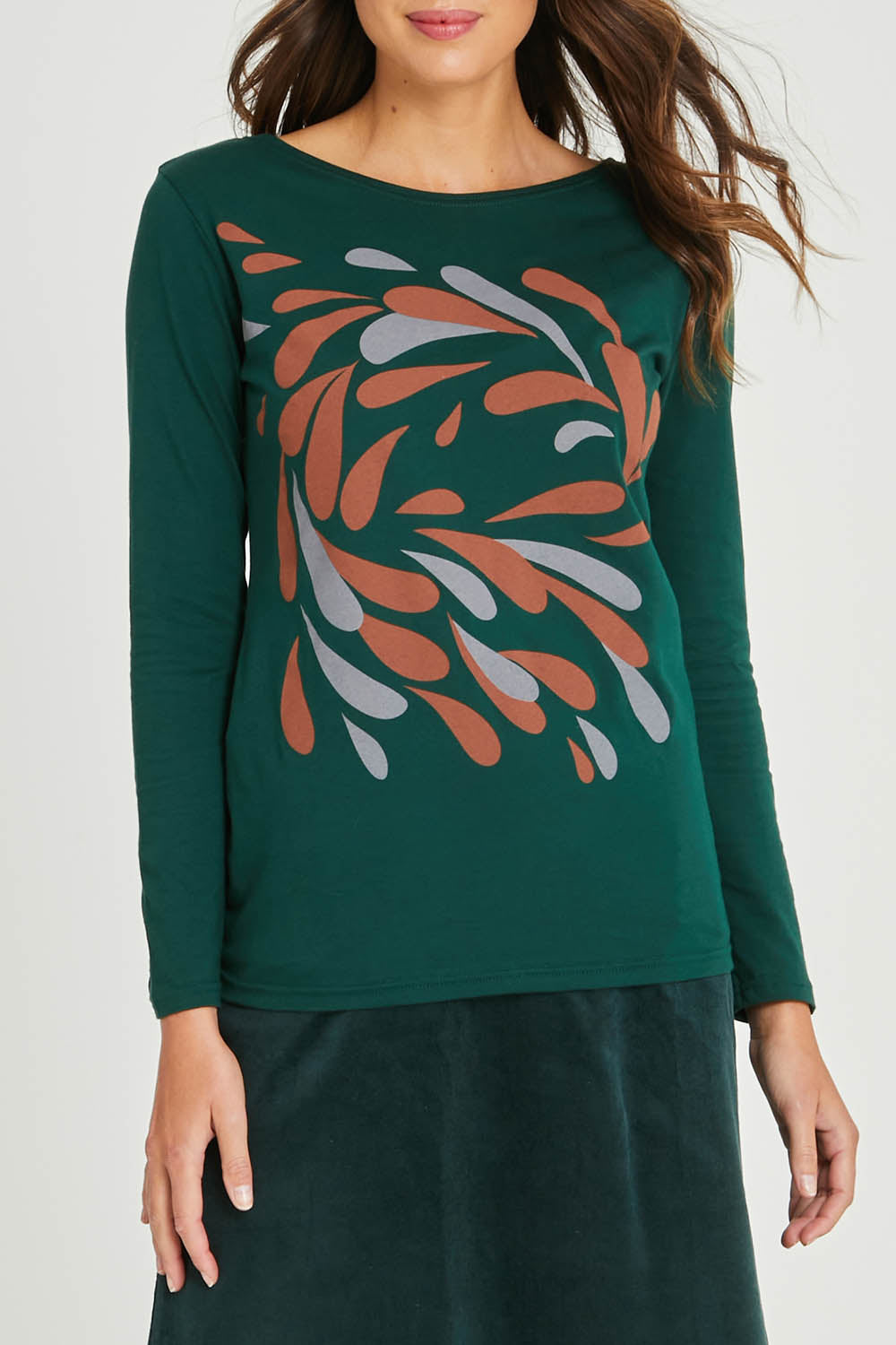 Model Madeline wearing size S of the Hanna Placement Tee in colour Forest (Green), from the front, cropped image