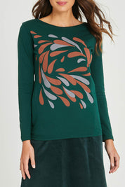 Model Madeline wearing size S of the Hanna Placement Tee in colour Forest (Green), from the front, cropped image