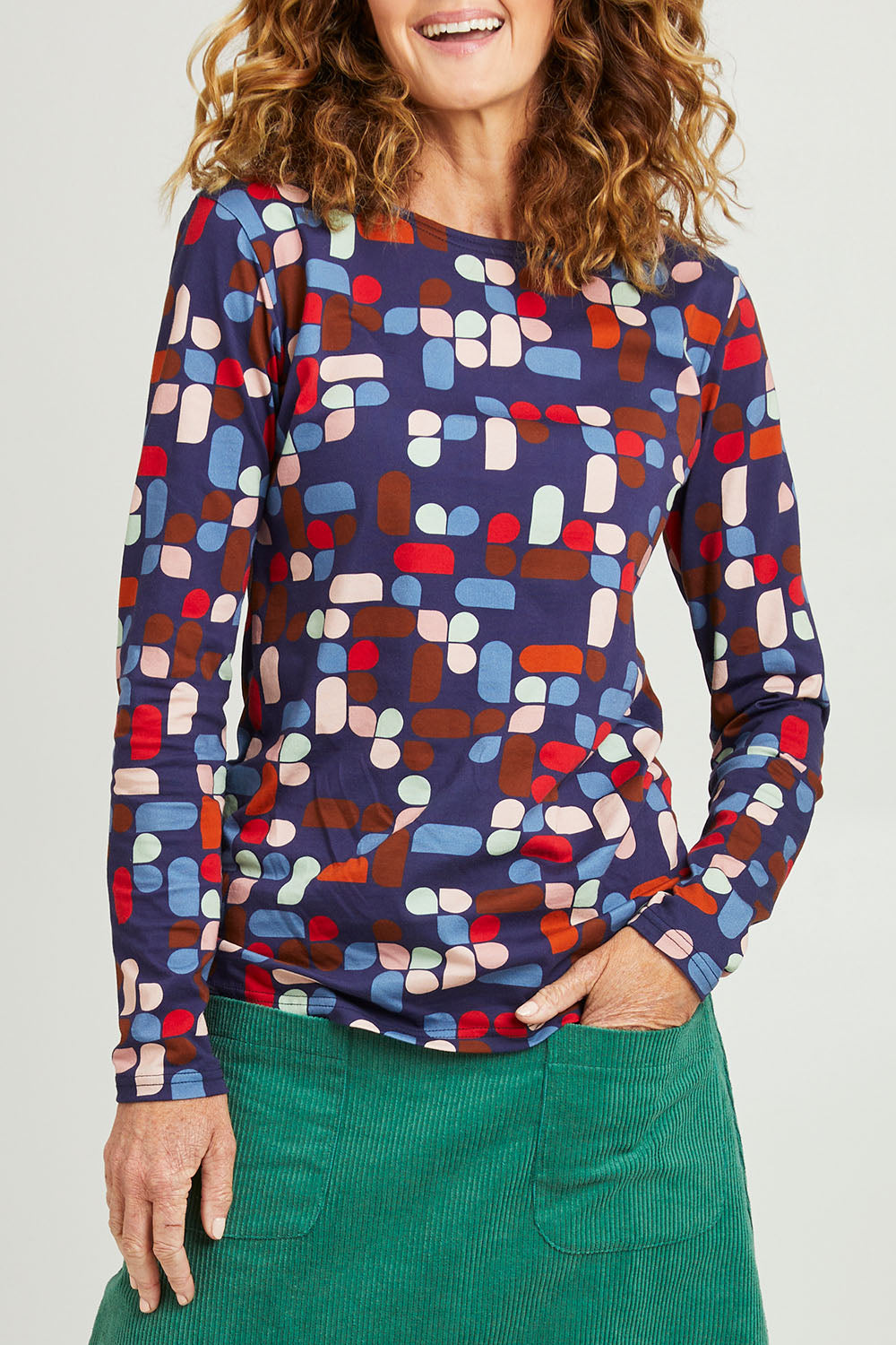 Model Emma wearing size S of the Abstract Boat Neck Tee in colour Blue (Blue), from the front, cropped image