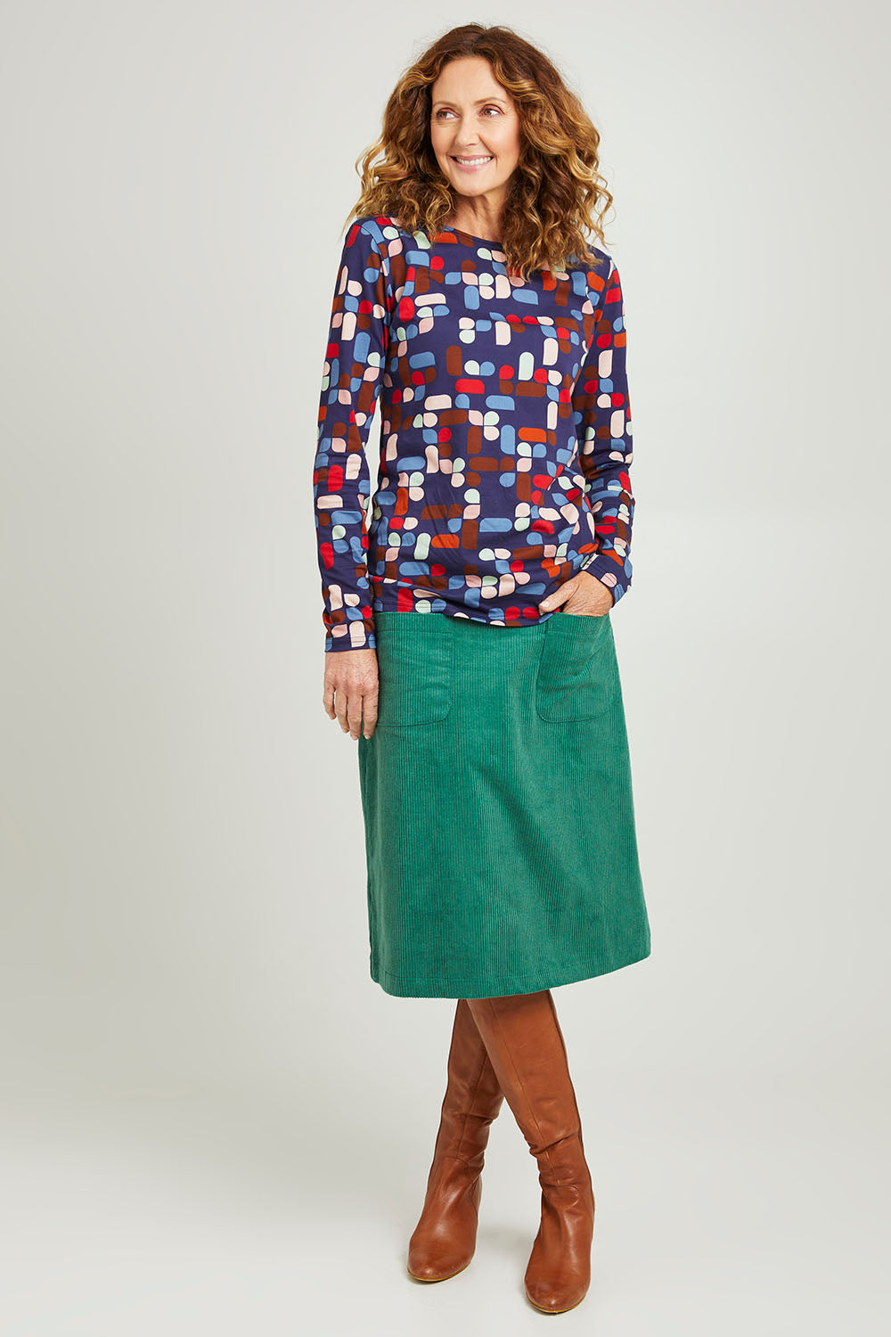 Model Emma wearing size S of the Abstract Boat Neck Tee in colour Blue (Blue), from the front, showing the whole outfit