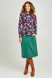 Model Emma wearing size S of the Abstract Boat Neck Tee in colour Blue (Blue), from the front, showing the whole outfit