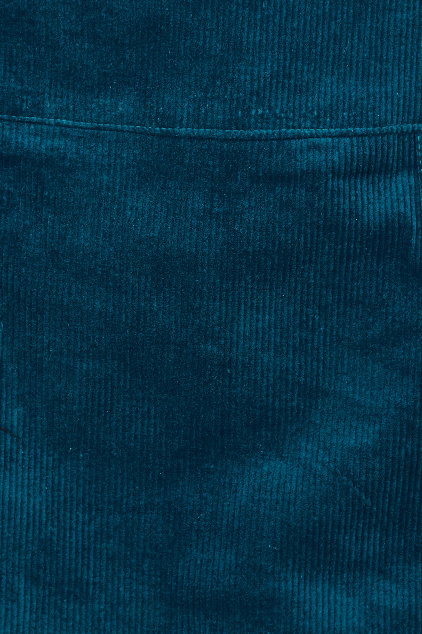 Product shot of the Amy Cord Skirt in colour Teal (Blue), detail