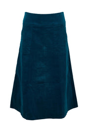 Product shot of the Amy Cord Midi Skirt in colour Teal (Blue), from the front