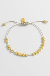 Product shot of the Stars So Bright Bracelet in colour Silvergold (Metallics), detail