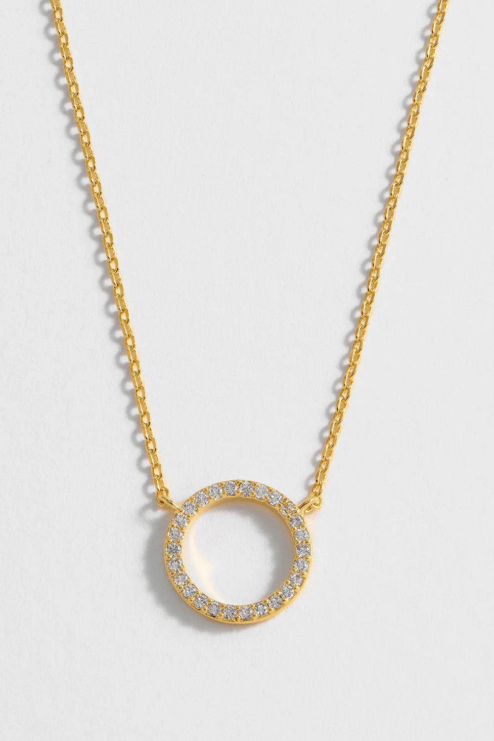 Product shot of the Circle Pave Necklace in colour Gold (Metallics), detail