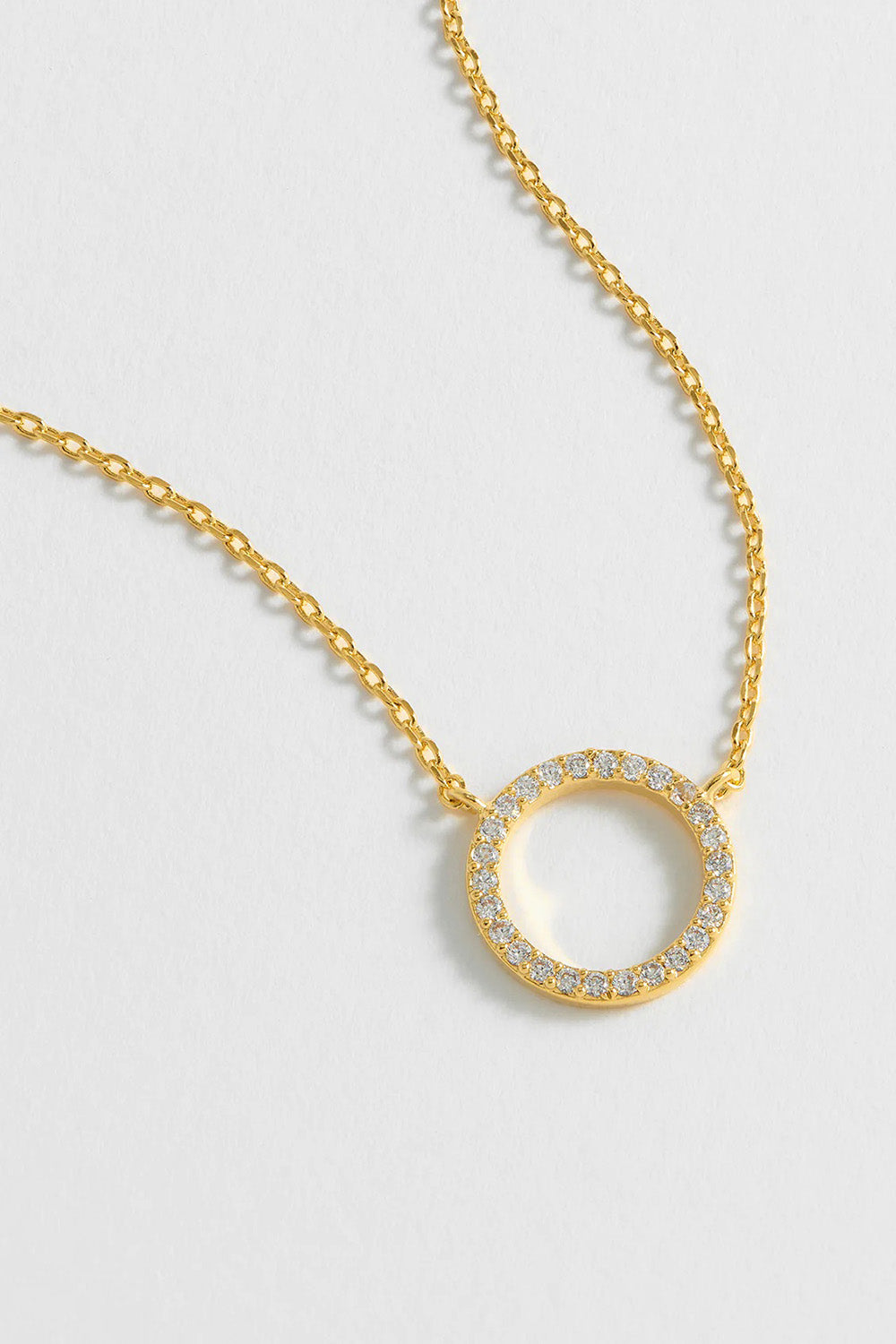 Product shot of the Circle Pave Necklace in colour Gold (Metallics), detail